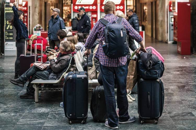 attach backpack to rolling suitcase